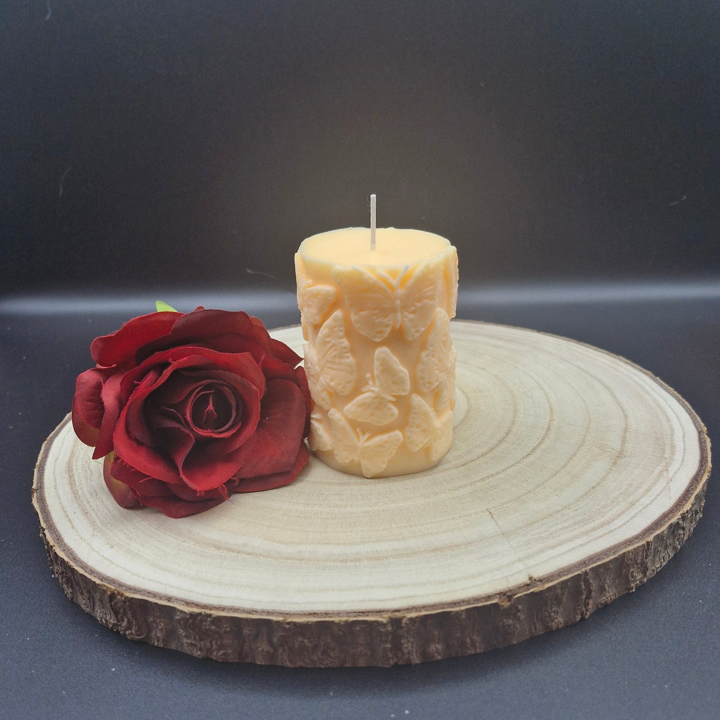 cylinder candle butterfly