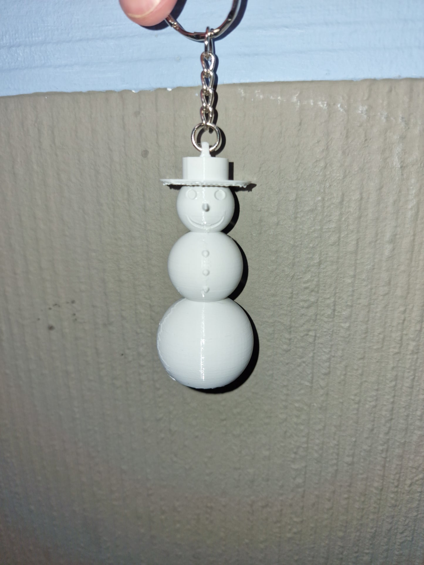 3d geprinte sneeuwpop sleutelhanger